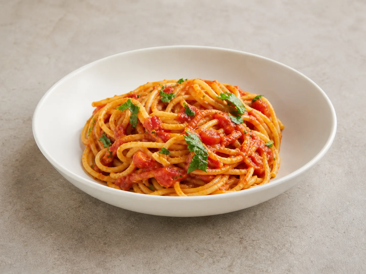 Vegetarian spaghetti coated in classic tomato sauce
